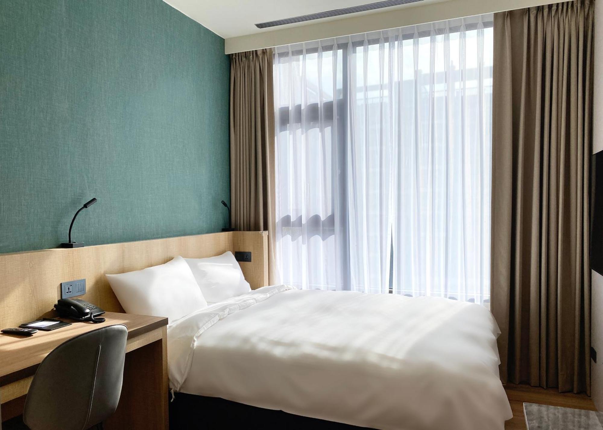 Alfar Hotel Taoyuan Rom bilde